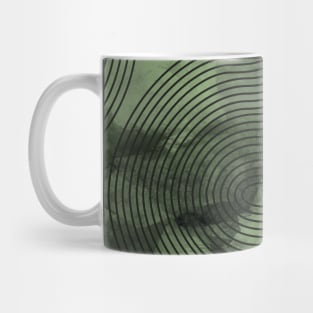 Black curves on green blob Mug